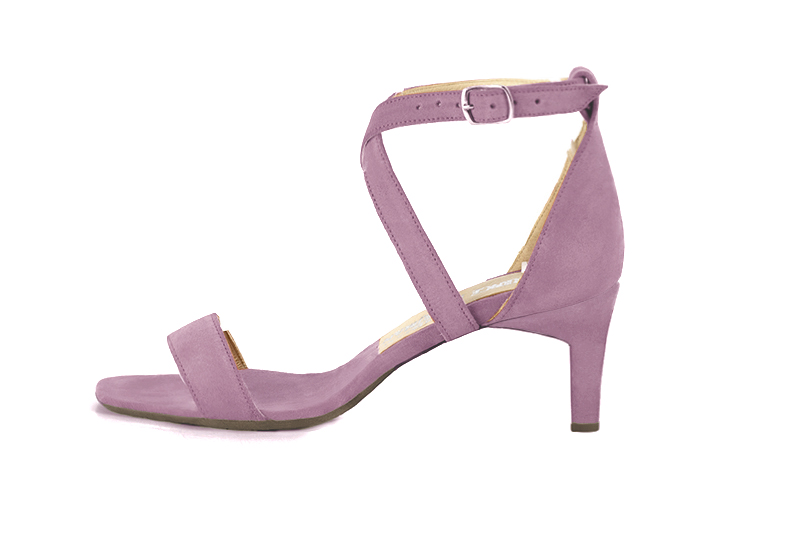Women's  elegant sandals closed at the back with crossed straps. .  - Profile view